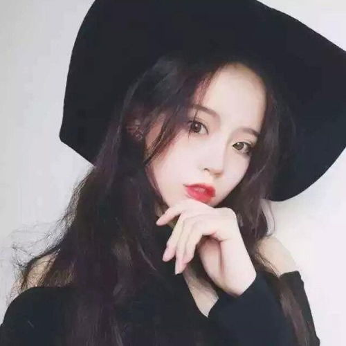 黑纱黑帽白净美人