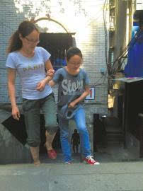 母亲12年陪脑瘫女儿走到高考毕业后相当翻译官