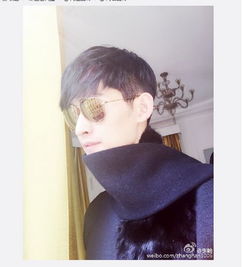 张翰晒帅照围黑色围巾戴墨镜